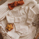 Snuggle Hunny Long Sleeve Organic Bodysuit. 5 LEFT